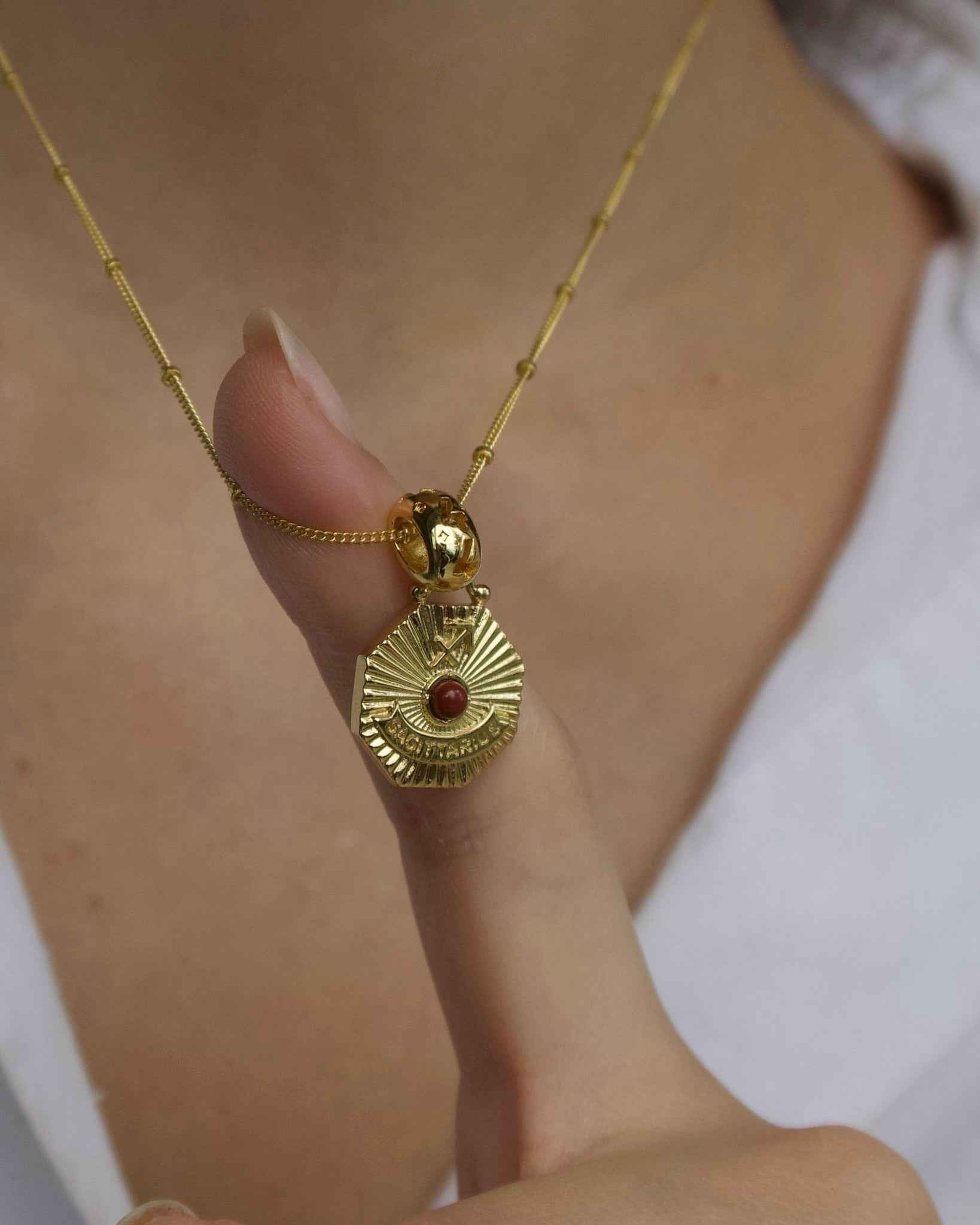 Becca Zodiac Charm