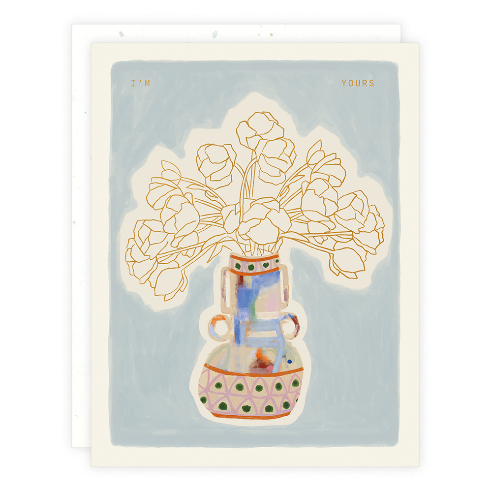 An A2 folded I’m Yours greeting card from Someday Studio featuring a painted vase with gold-outlined flowers and the words IM and YOURS in the upper corners.