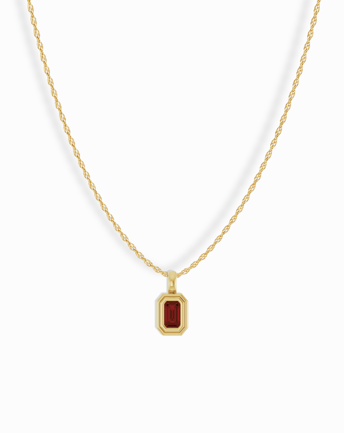 14k Birthstone Pendant Necklace featuring a gold chain with a rectangular pendant and a deep red gemstone.