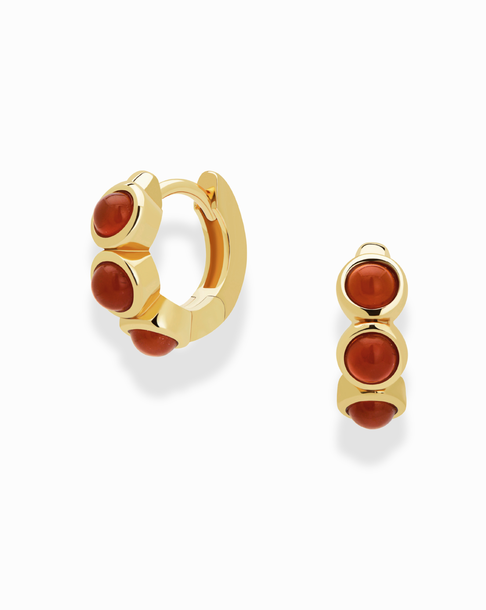 The Mod + Jo *Preorder* Corynn Gemstone Huggies are 18k gold plated hoop earrings, each with three smooth, round genuine red agate stones set vertically in a stylish, modern design and shown on a white background.
