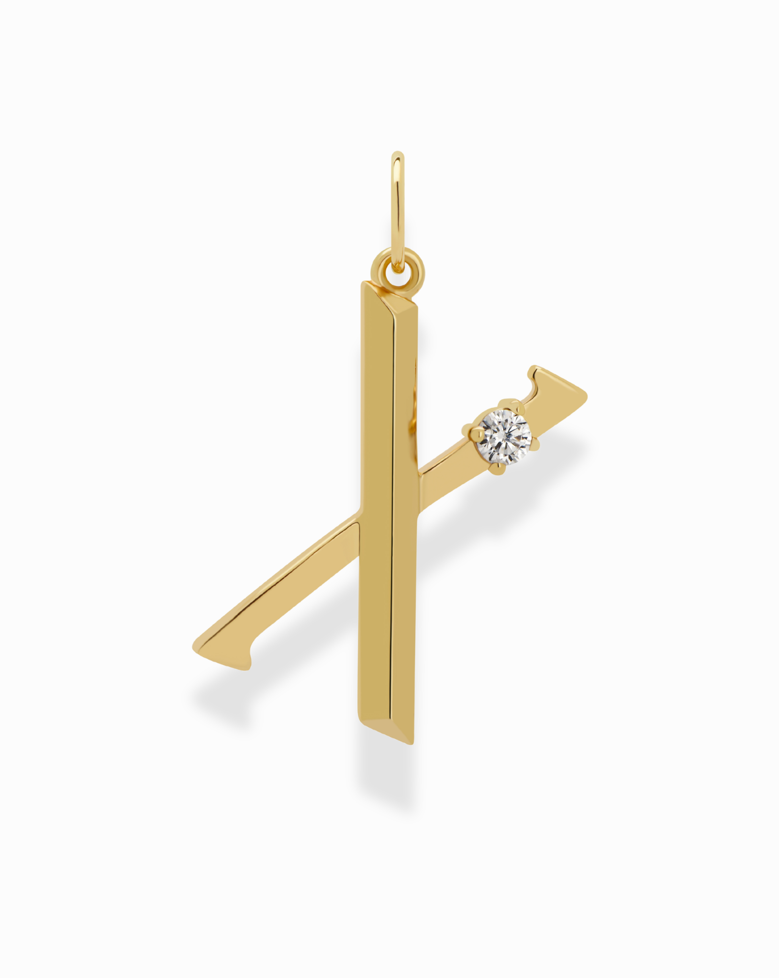 The Eloise Letter Charm by Mod + Jo is a gold K-shaped charm with a small round cubic zirconia accent on the upper right, set against a white background.