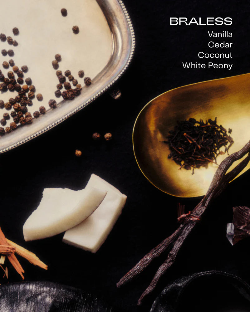 Spices and vanilla beans on a dark surface with 'BRALESS' branding.