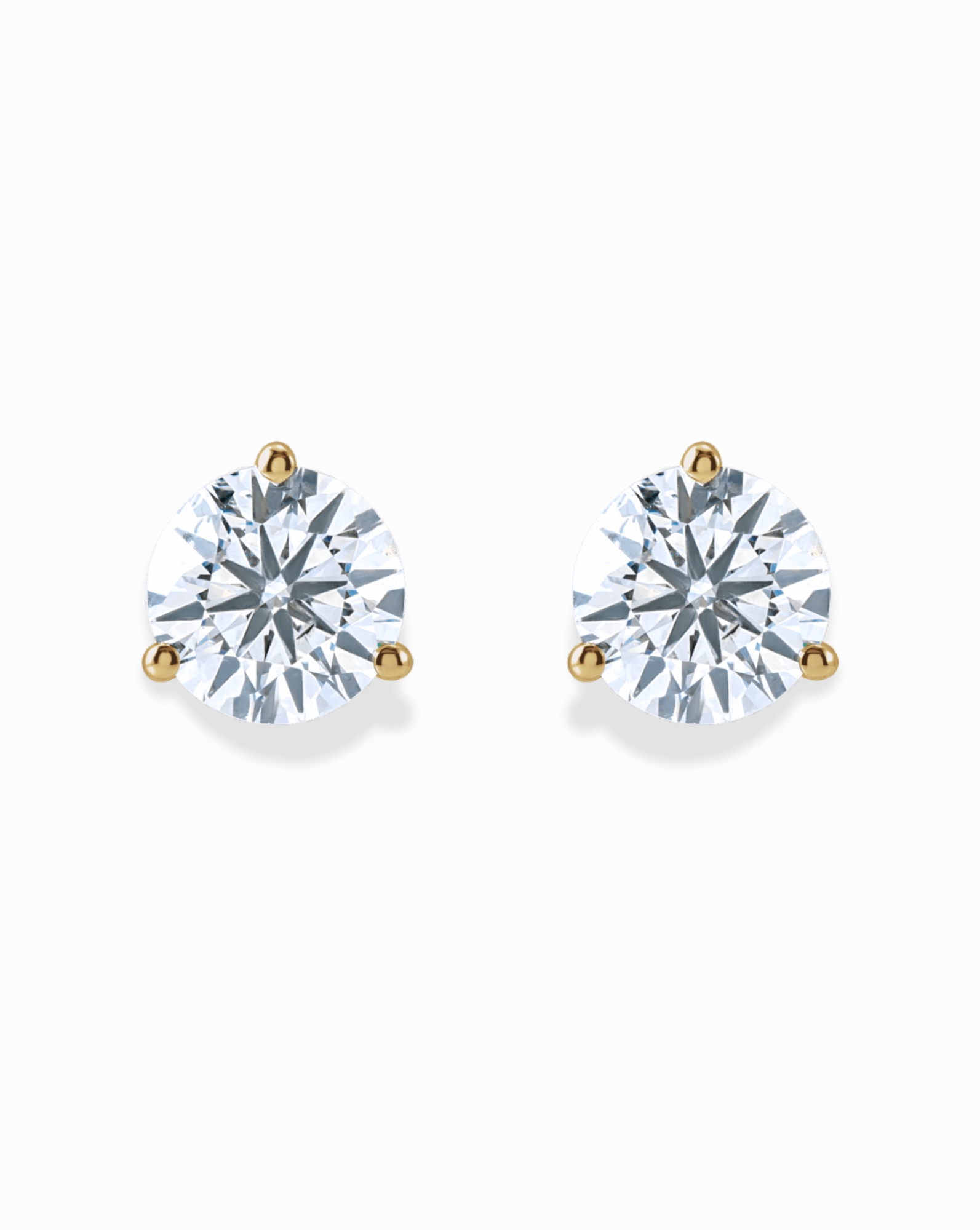 The Mod + Jo 14k Diamond Stud Earrings feature round lab-grown diamonds set in 14k gold prongs, displayed against a plain white background.