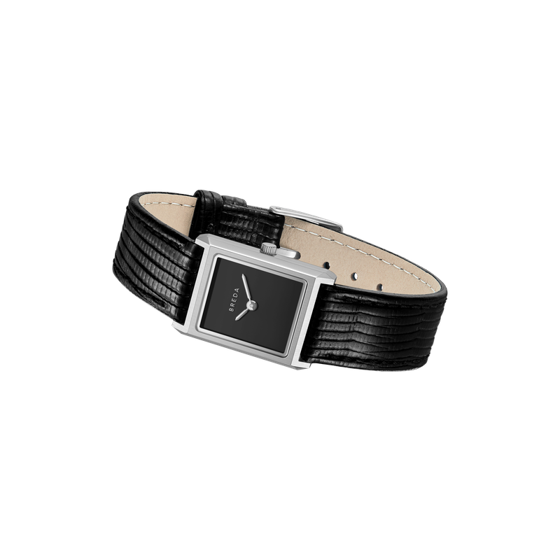The Virgil Watch Small (Lizard Embossed) by Breda features a slim rectangular stainless steel frame, minimalist black dial, and black lizard-embossed leather band—an elegant vintage-inspired timepiece displayed on a light background.