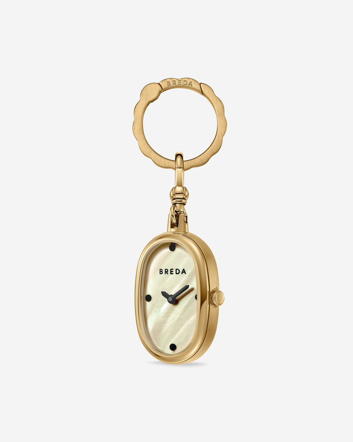 Jane Time Charm by BREDA—a gold-plated, oval keychain-style timepiece featuring a mother of pearl dial with black hour markers, BREDA branding at the top, and a decorative gold key ring—elegantly displayed on a plain white background.
