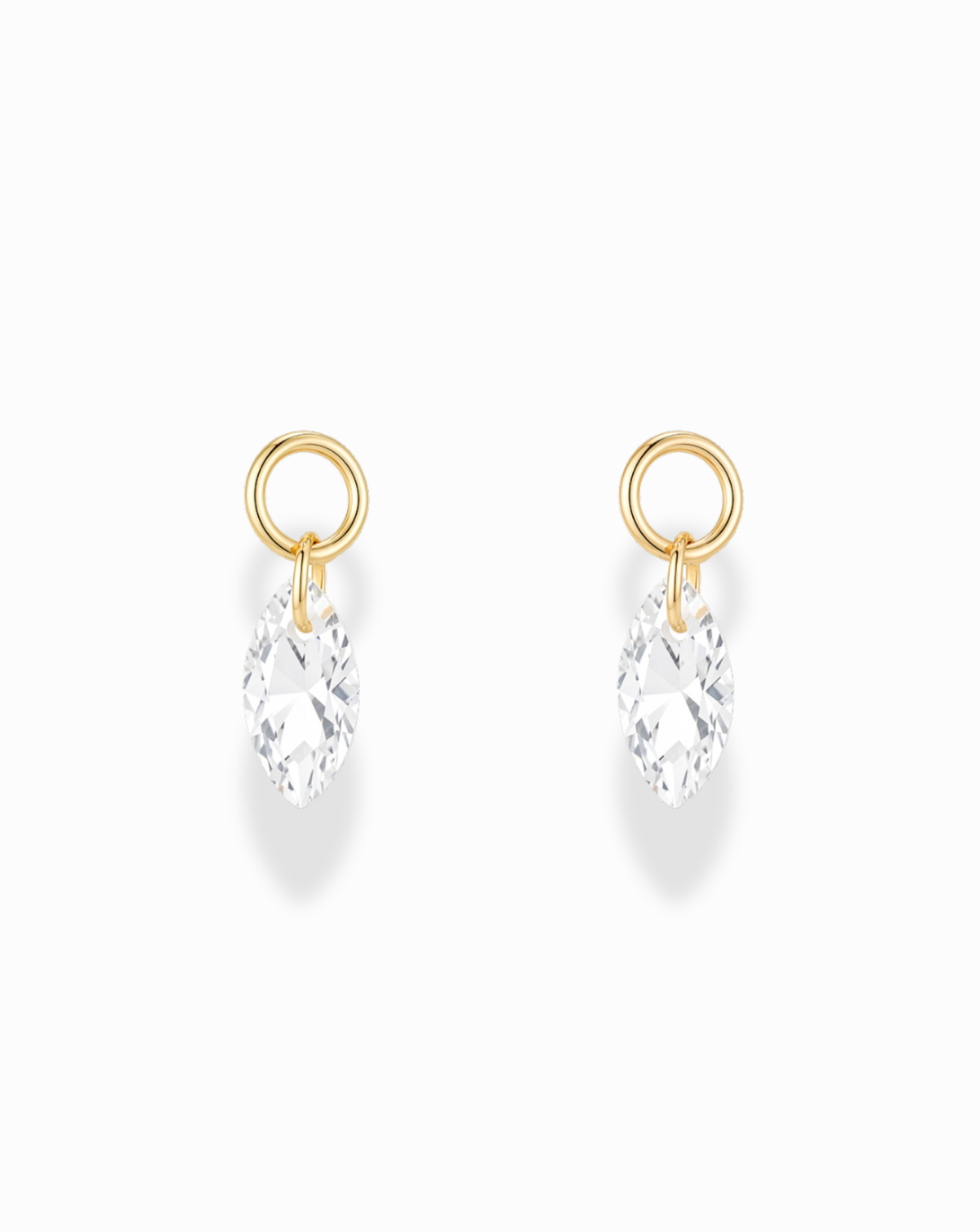 Mod + Jo Cove Sapphire Earring Charms featuring two gold hoop charms, each with a marquise-cut lab-grown white sapphire pendant in a floating setting.