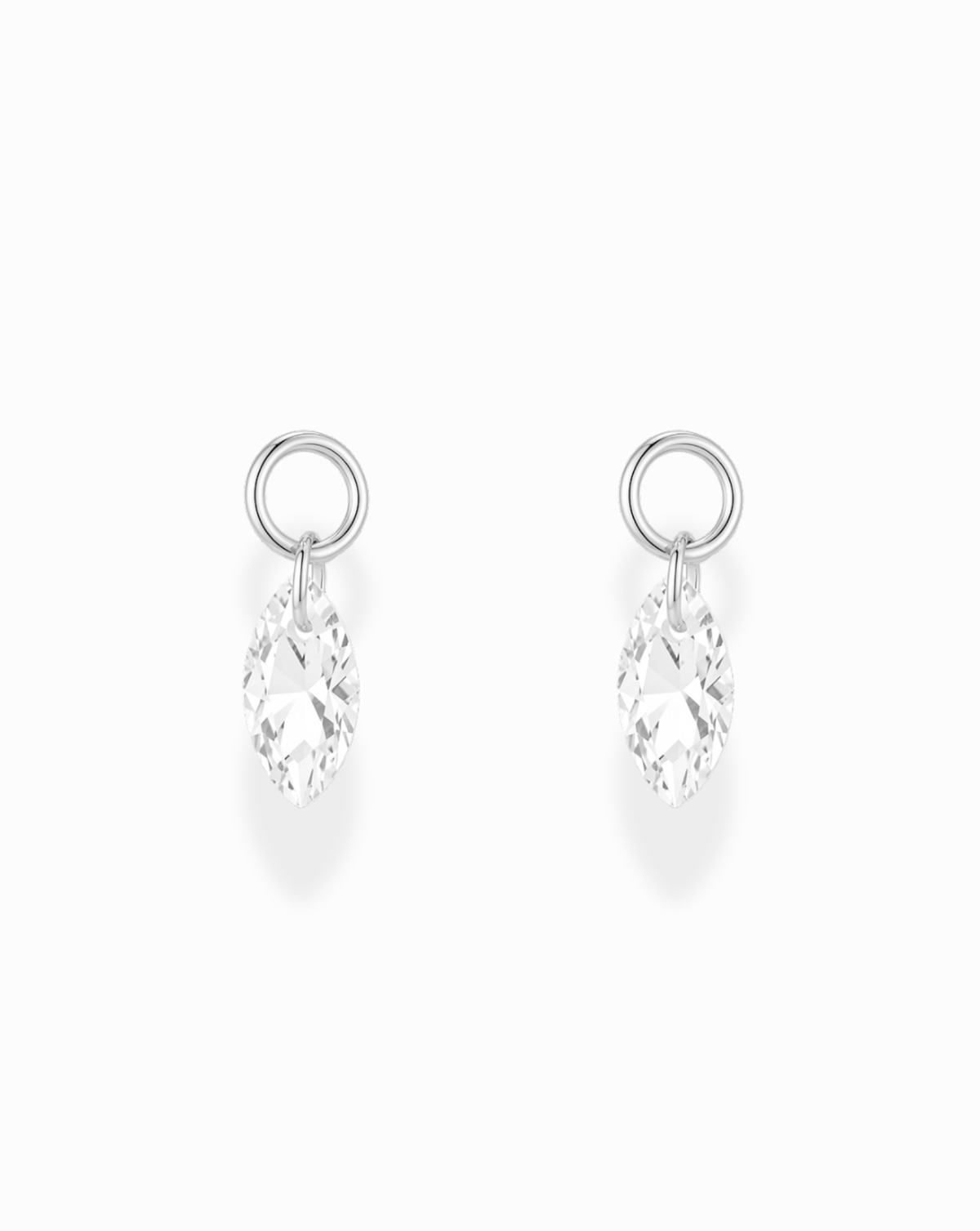 Mod + Jo Cove Sapphire Earring Charms featuring two silver hoops with a lab-grown white sapphire in a marquise-cut floating setting.