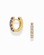 The Harlow Reversible Birthstone Huggies by Mod + Jo are gold plated hoops, featuring purple gems on one side and clear stones on the other—wear them either way for a versatile, stylish look. Shown on a white background.