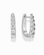 Jules Grande Huggies: a pair of tarnish-resistant silver hoop earrings set with five round cubic zirconia stones each.
