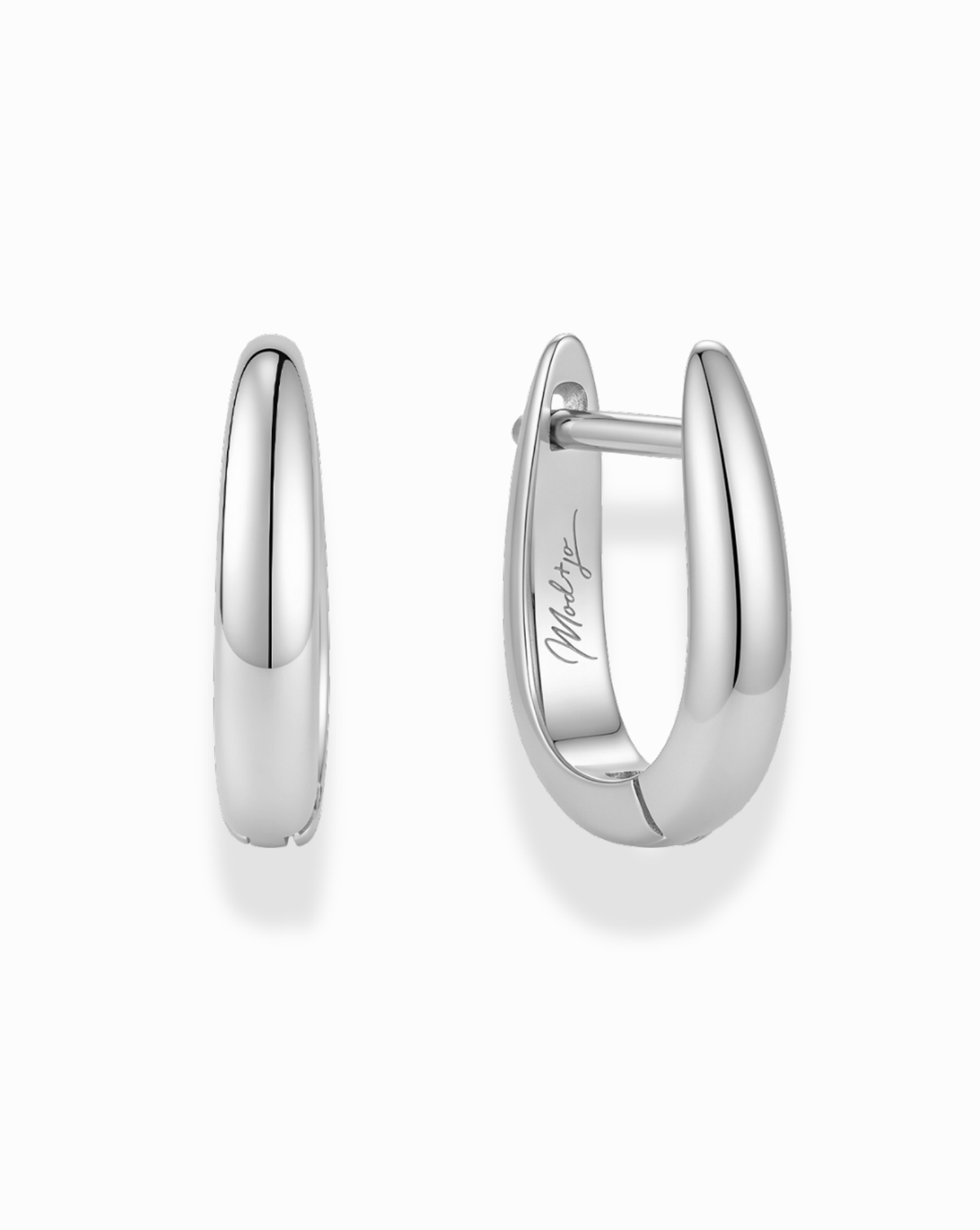 Jules Smooth Huggies, a pair of polished silver-plated hoop earrings, with one shown from the front and one shown from the side featuring a hinged post.