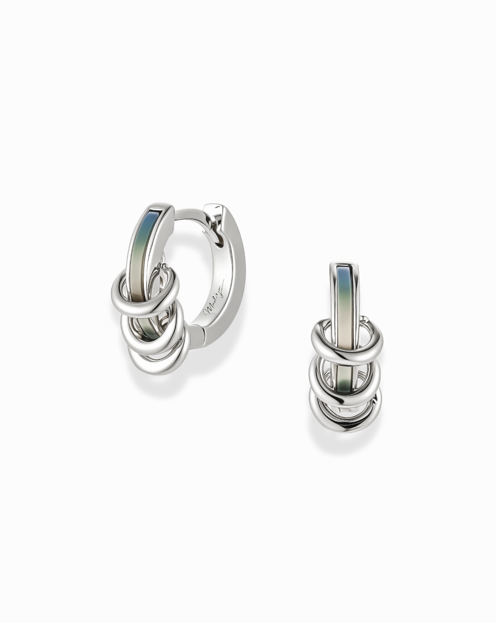 Mod + Jo's Levi Huggies feature three interlocking, tarnish-resistant silver rings with a smooth iridescent accent, showcased on a white background.