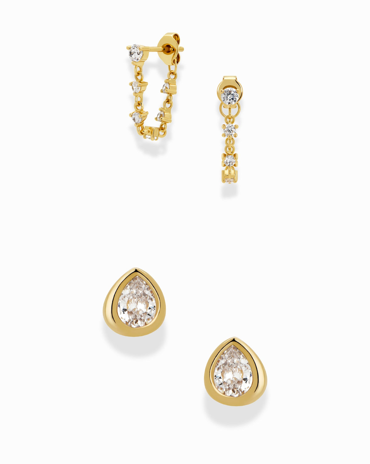 Mod + Jo Lucy + Joni Set featuring two pairs of gold earrings: Lucy Chain Studs with small stones and Joni Bezel teardrop-shaped studs.