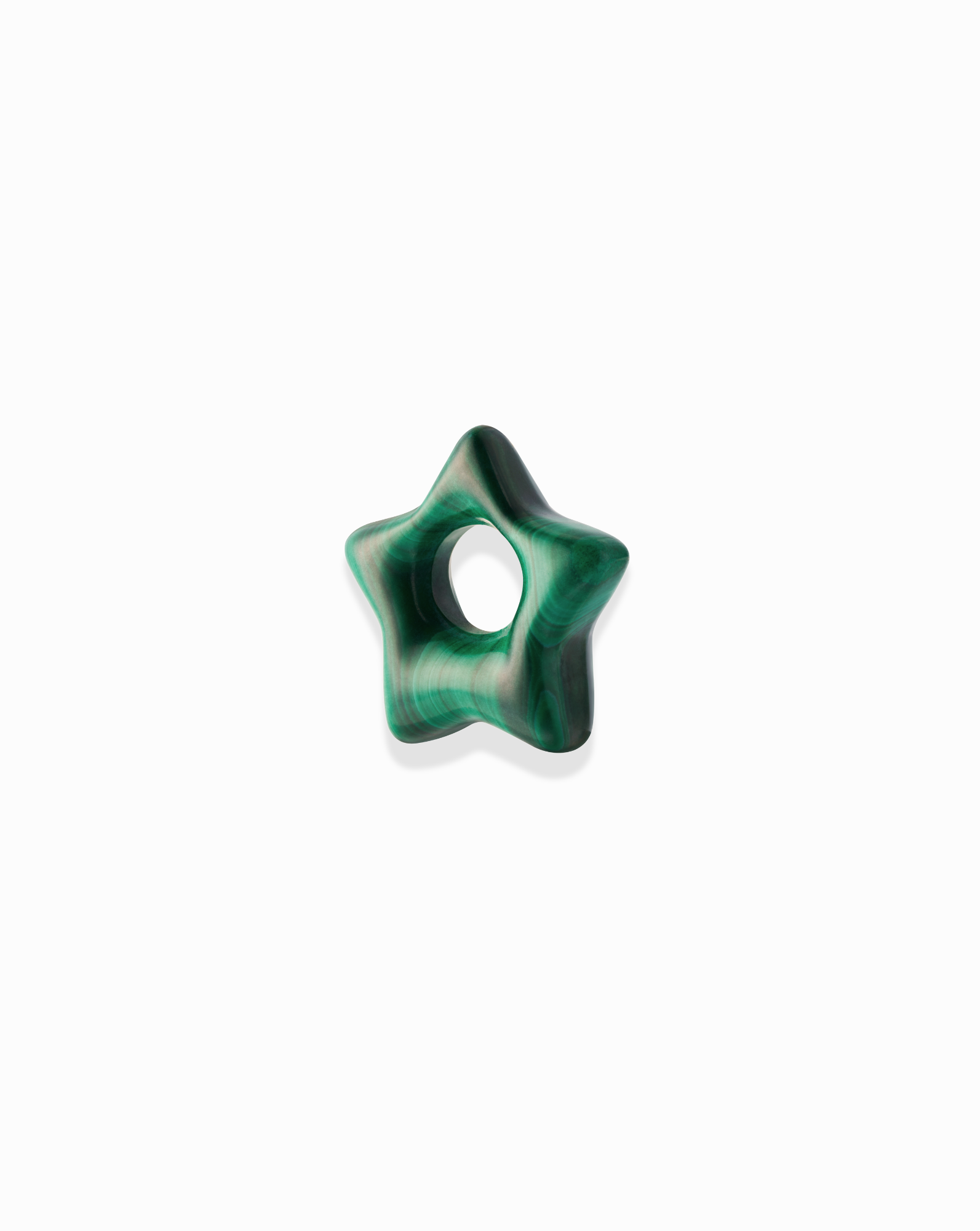 The Mod + Jo Maia Star Gemstone Spacer is a small, green, star-shaped bead with a smooth, marbled texture and a circular center hole, resembling natural semi-precious stone, shown against a plain white background.