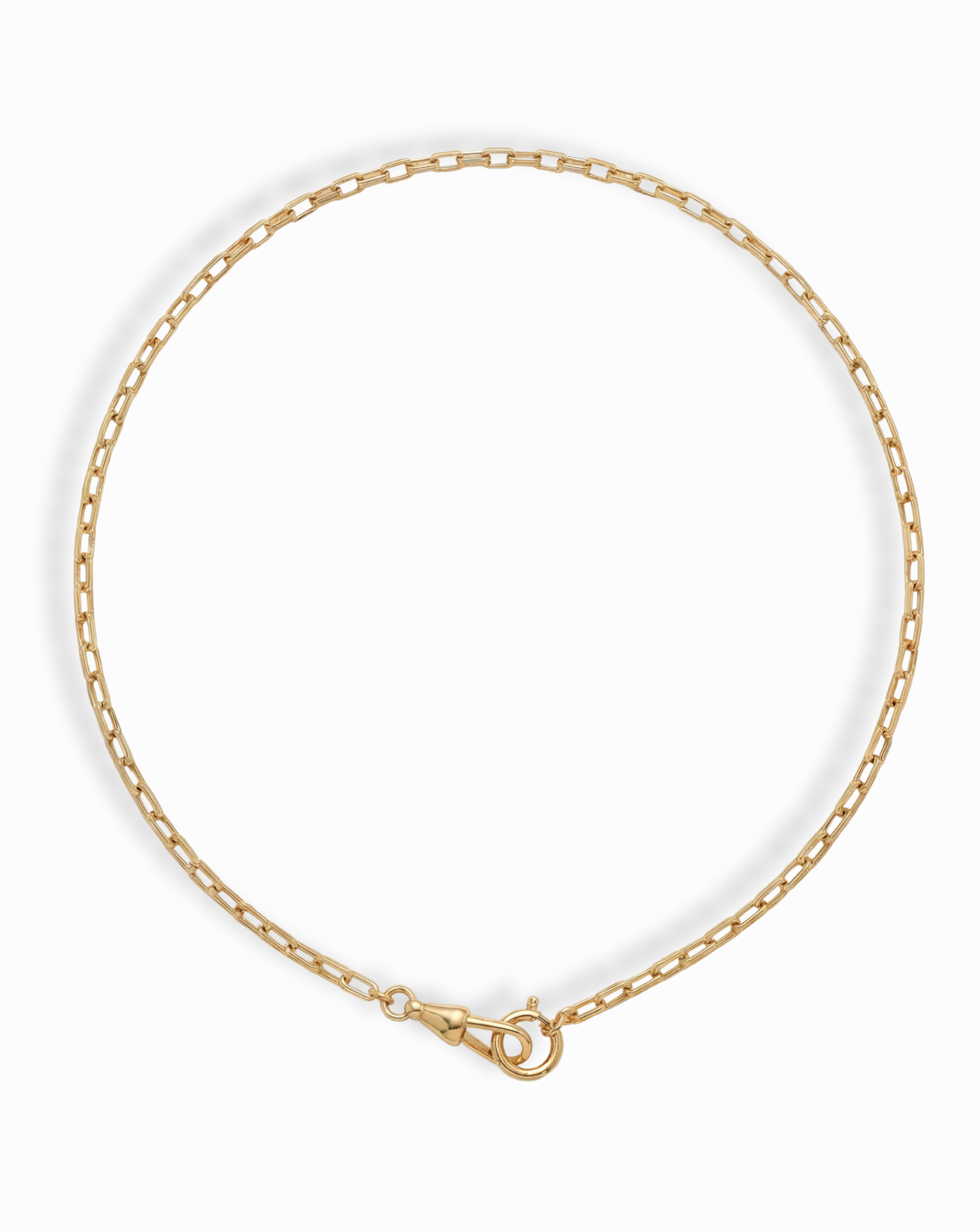 Gold chain necklace on a white background