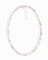 The Mod + Jo Merit Gemstone Necklace features small, multicolored beads, a gold clasp, short extension chain, and round charm. Handmade in Dallas and displayed on a white background.
