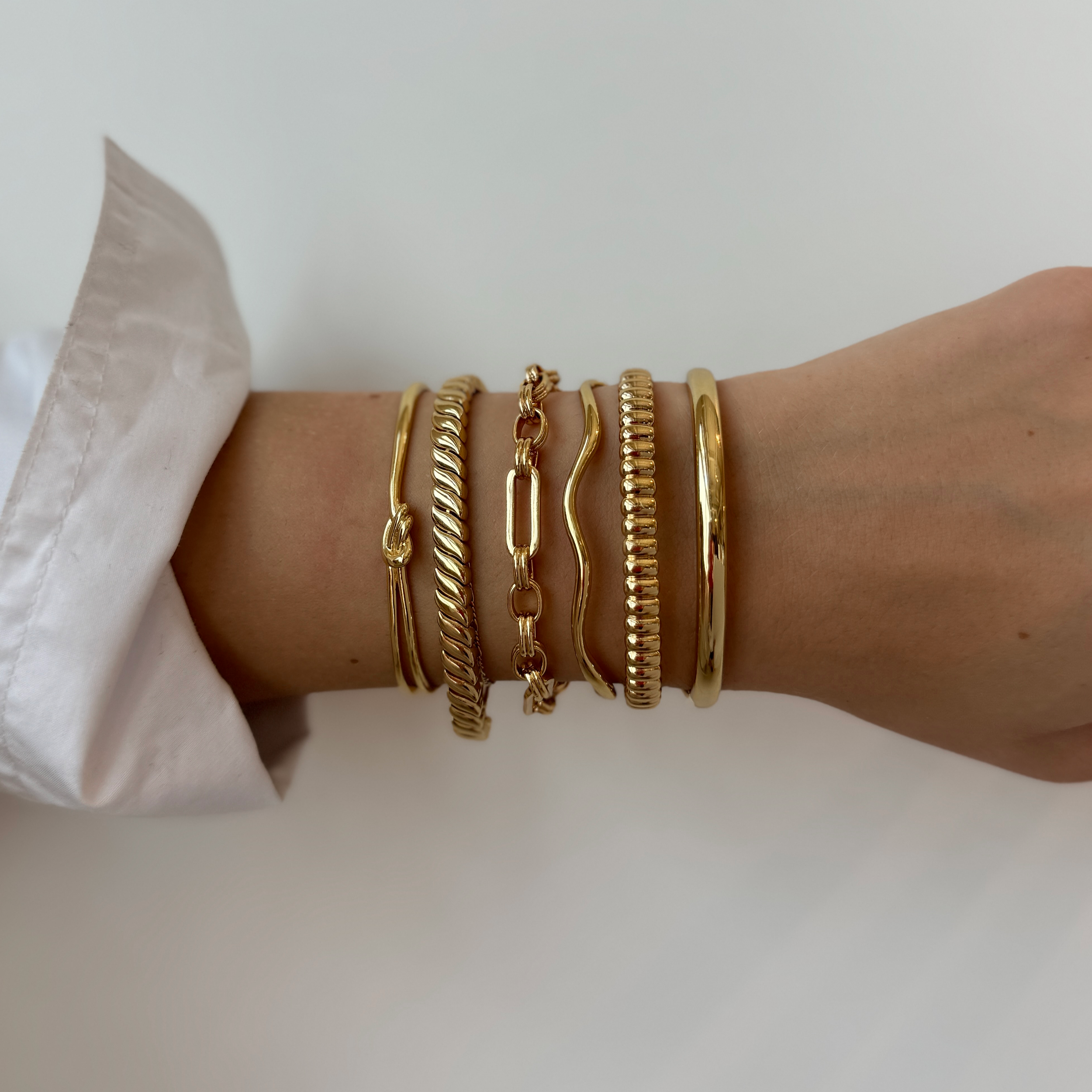 gold bangle and cuff bracelets | Mod + Jo