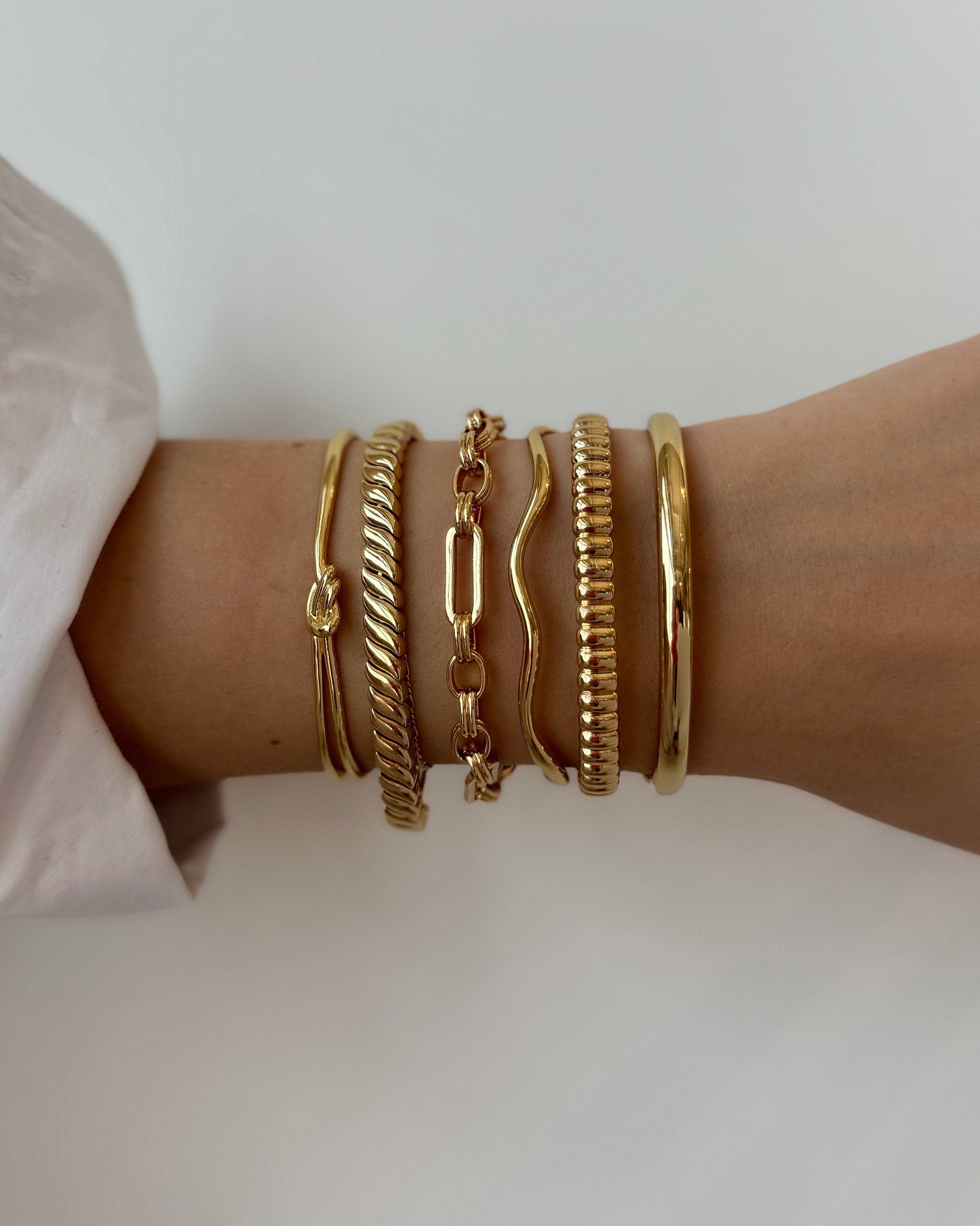 gold bangle and cuff bracelets | Mod + Jo