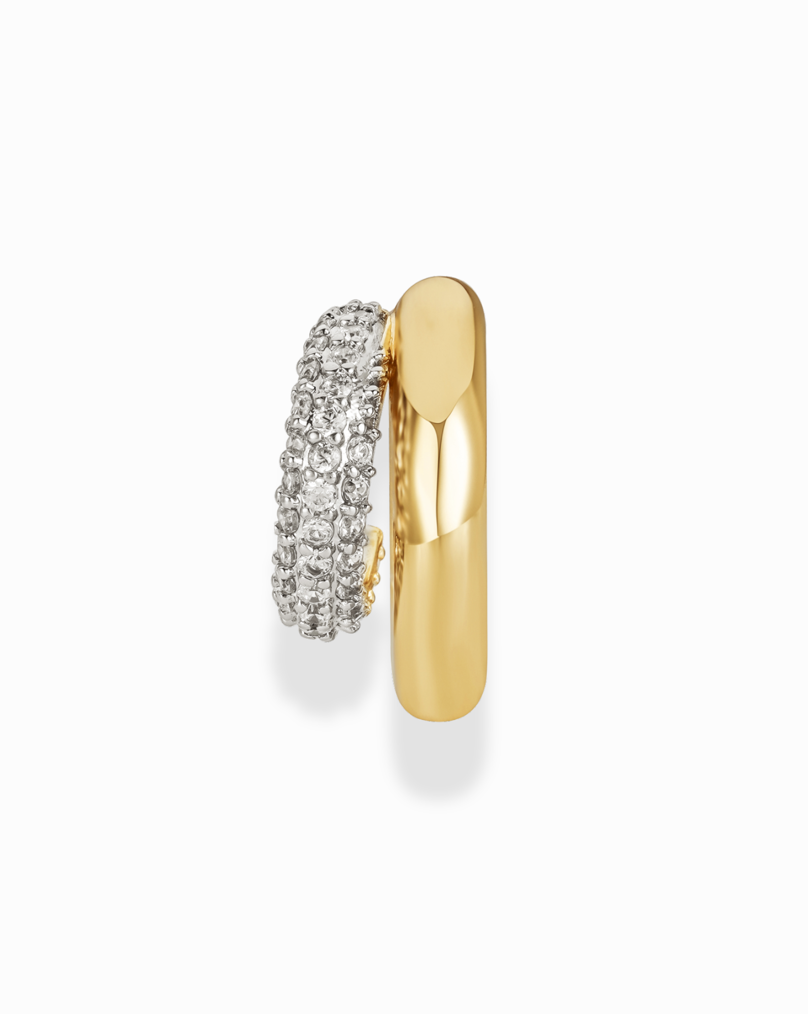 The Nyla Pave Ear Cuff by Mod + Jo features a gold hoop design with one smooth, polished side and another side adorned with rows of sparkling CZ accents, shown against a white background.