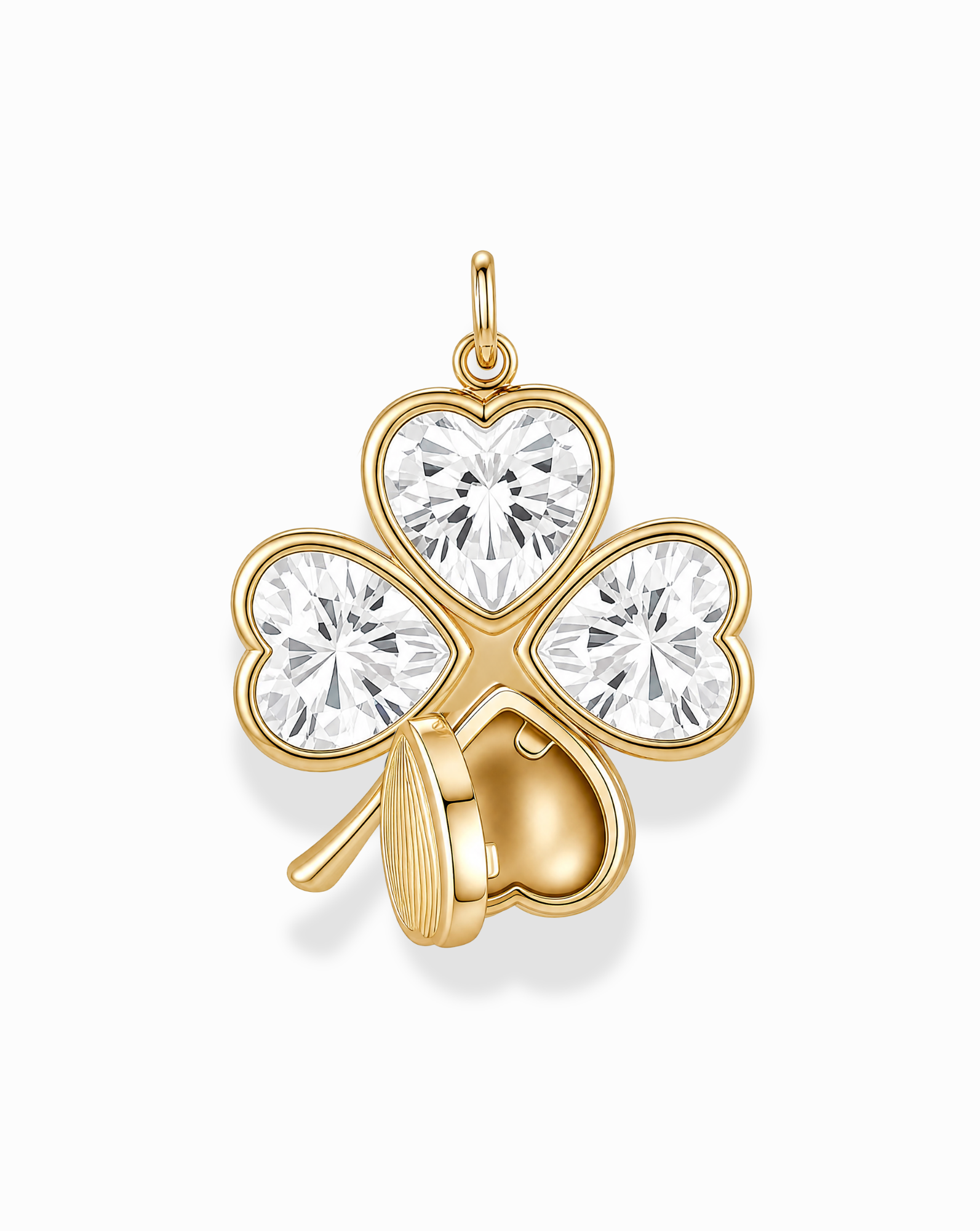 The Perry Four-Leaf Clover Locket Charm by Mod + Jo features a gold clover design, with each leaf crafted from heart-cut CZ crystals and one leaf partially adorned by a delicate gold heart.
