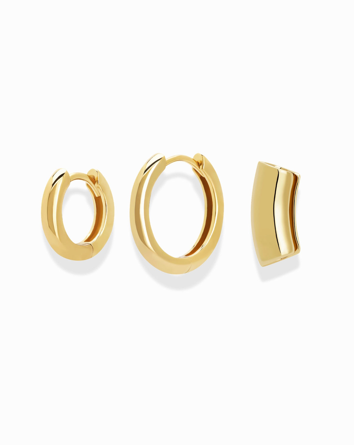Reneé + Lennon Set featuring three smooth huggie hoop earrings, including two round designs and one curved rectangular shape.