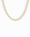 A close-up of the Mod + Jo Romee Puffy Mariner Necklace, featuring elegant oval links in 14k gold. The partially shown chain forms a gentle curve against a white background, highlighting its refined anchor link design.