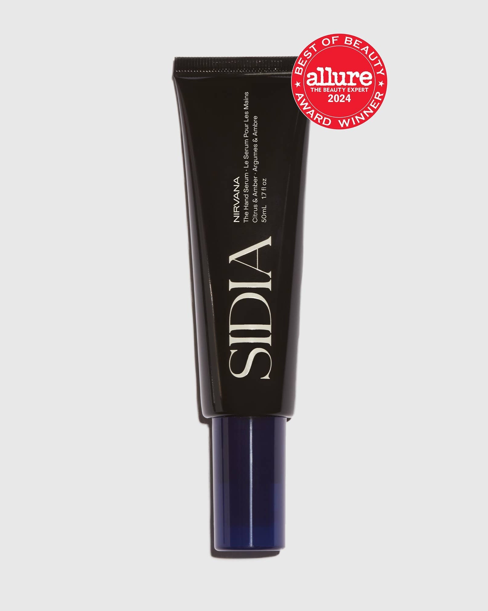 Black skincare tube with 'SIDIA' branding and 'Allure' award badge on a light gray background